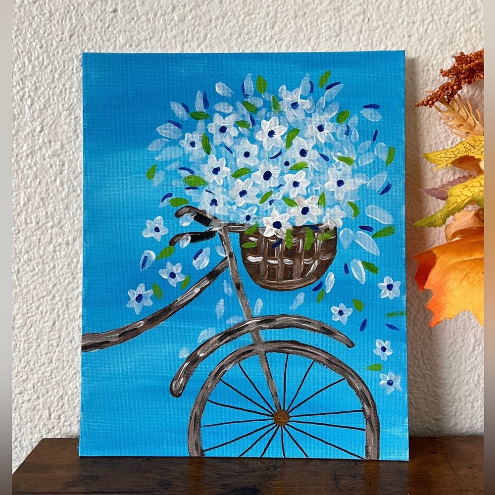 Hand- drawn canvas panel with a bicycle inspired.